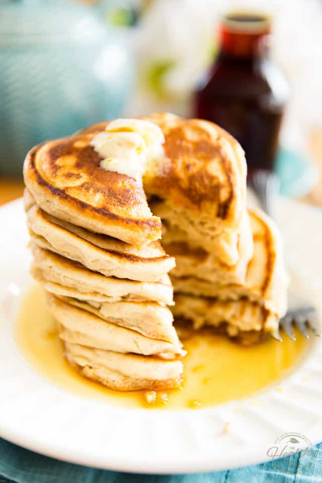 Quick and easy to make, these Light and Fluffy Vegan Pancakes are the ultimate comforting Sunday breakfast! Guaranteed to please everyone - no one will never know they're made with whole wheat flour!