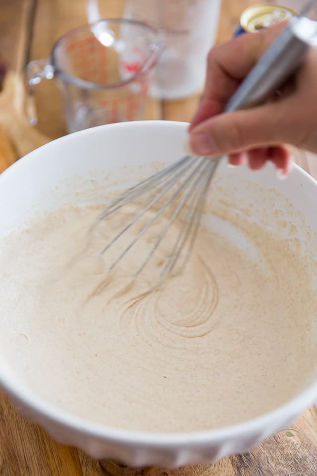 Delicately whisk until the batter loosens up and comes together
